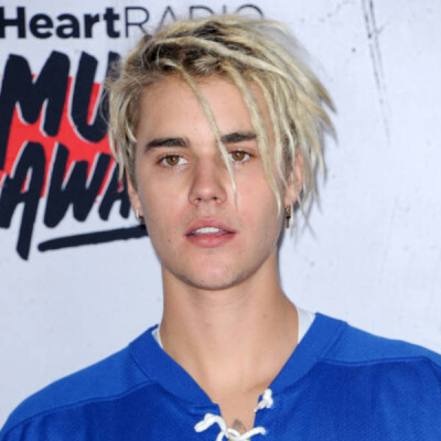 From YouTube to Superstar: The Role of Scooter Braun in Justin Bieber's Success