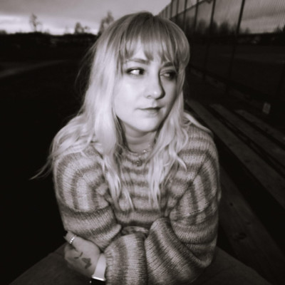 Ashley Woods: A Symphony of Lyrics, Nostalgia, and Self-DiscoveryIn the vast expanse of the music world, certain artists possess the unique ability to